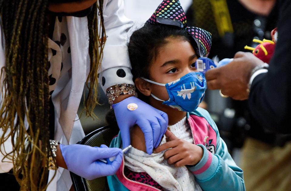 Peyton Roth gets her COVID-19 vaccine during a vaccine clinic for students, aged 5-11, on the Alabama State University campus in Montgomery on Jan. 21. The clinic was run as a partnership between Alabama State University, Montgomery Public Schools and the Alabama Department of Public Health.