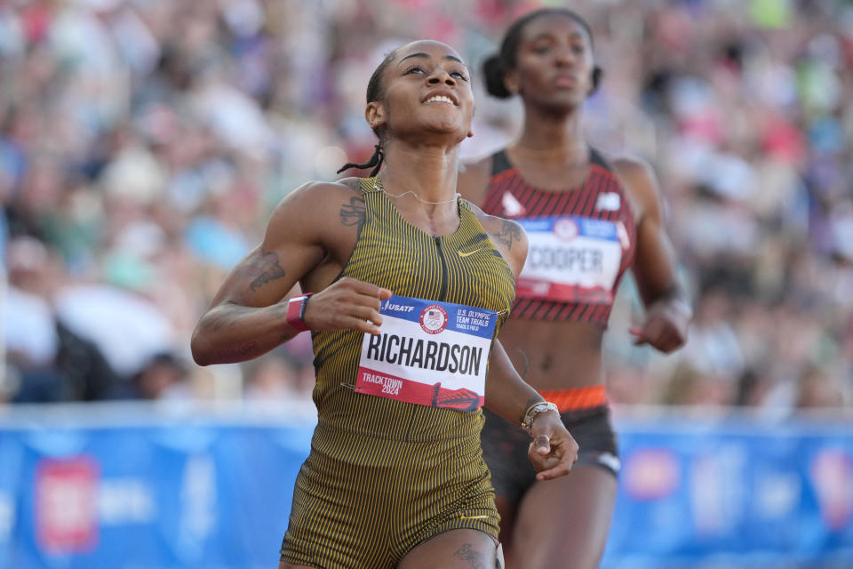 Jun 28, 2024; Eugene, OR, USA; Sha'Carri Richardson celebrates after winning the women's 200m heat in 21.92 during the US Olympic Team Trials at Hayward Field. Mandatory Credit: Kirby Lee-USA TODAY Sports