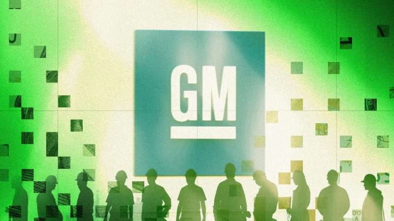 Workers lined up against the backdrop of the General Motors logo
