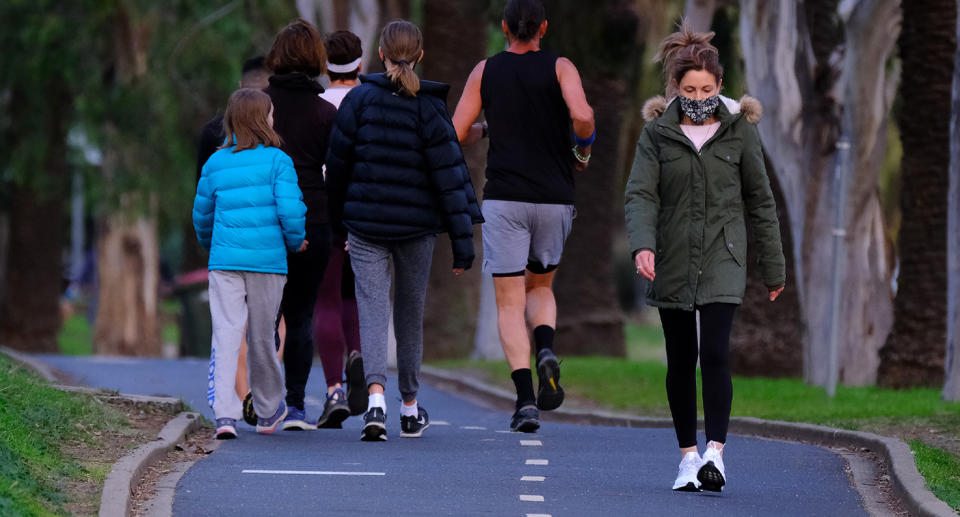 Melburnians anxiously await a decision on the city's lockdown. Source: AAP