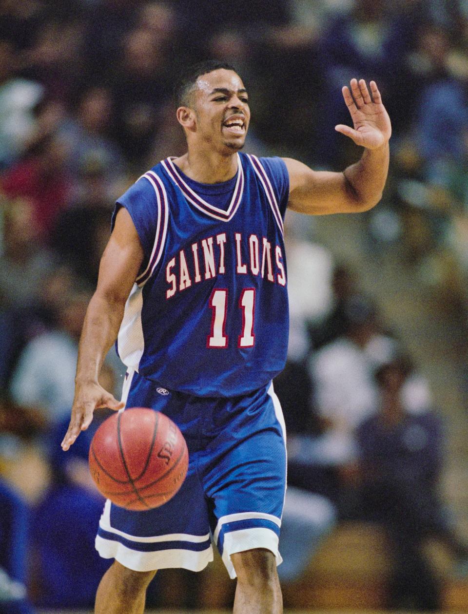 Jamall Walker #11, Guard for the Saint Louis Billikens dribbles the ball down court during the NCAA Pac - 10 Conference college basketball game against the University of California, Los Angeles UCLA Bruins on 20th December 1997 at the Pauley Pavilion, Westwood, California, United States. The Bruins won the game 73 - 67. (Photo by Aubrey Washington/Allsport/Getty Images)