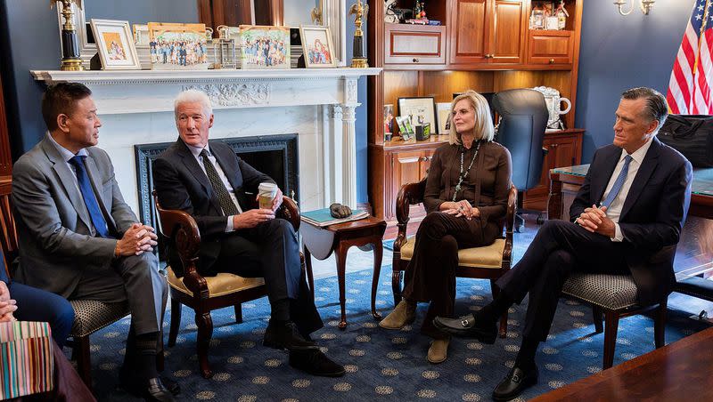 Sen. Mitt Romney and his wife, Ann, meet with actor and activist Richard Gere, second from left and Penpa Tsering, left, on Tuesday Oct, 17, 2023, in Washington, D.C. Tsering’s title is Sikyong, which means he leads the Tibetan people in exile as head of the Central Tibetan Administration.