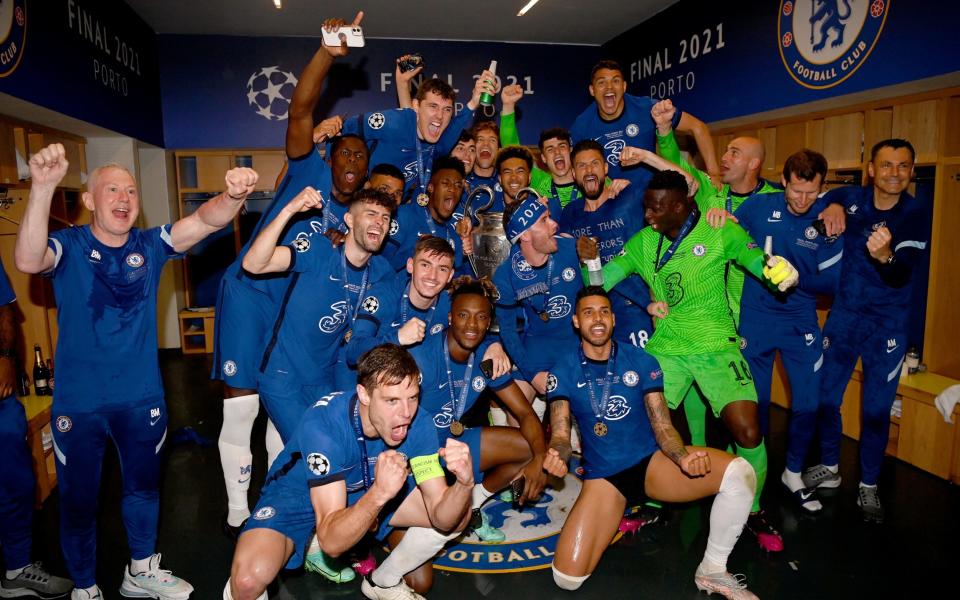 Players and staff of Chelsea celebrate in the dressing room after winning the UEFA Champions League Final between Manchester City and Chelsea FC at Estadio do Dragao on May 29, 2021 in Porto - Getty Images