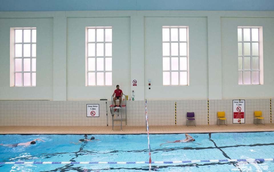 Swimmers at Ironmonger Row Baths and Better Leisure Centres as indoor gyms, swimming pools and sports facilities can reopen as part of the latest easing of coronavirus lockdown measures  - PA