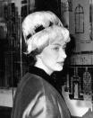 <p>Princess Margaret wears an extravagant hat in 1963.</p>