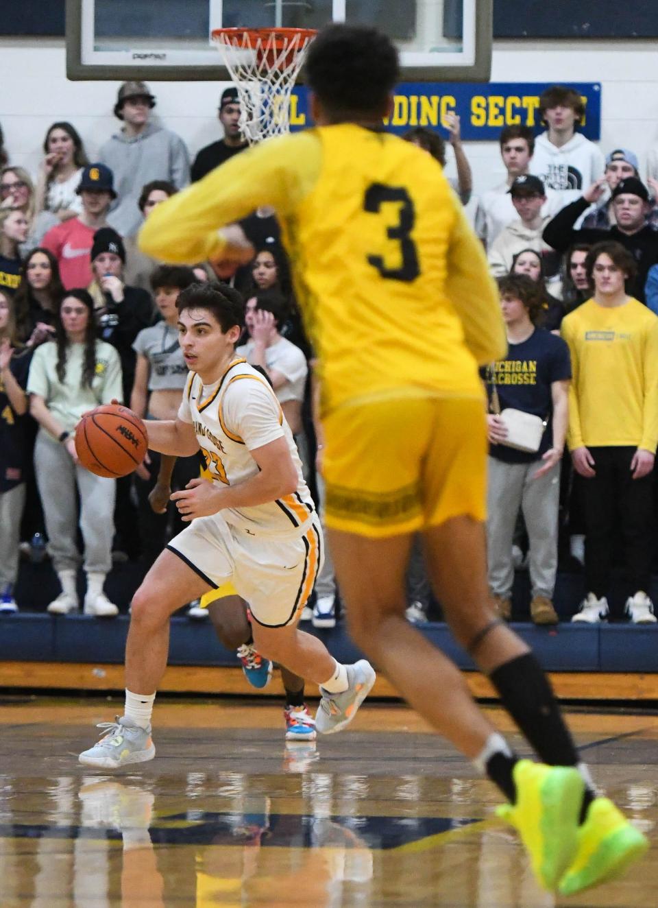 Caleb Estrada of Grand Ledge moves the ball against Waverly Thursday, Jan. 19, 2023, at Grand Ledge.