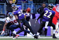 BALTIMORE, MD - JANUARY 15: Ed Reed #20 of the Baltimore Ravens intercepts the ball against Andre Johnson #80 of the Houston Texans during the fourth quarter of the AFC Divisional playoff game at M&T Bank Stadium on January 15, 2012 in Baltimore, Maryland. (Photo by Chris Trotman/Getty Images)