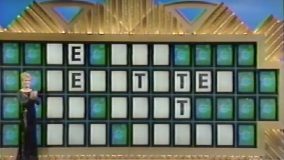 Vanna White stands next to a clue on the Wheel of Fortune board during Matthew Fenwick's episode.