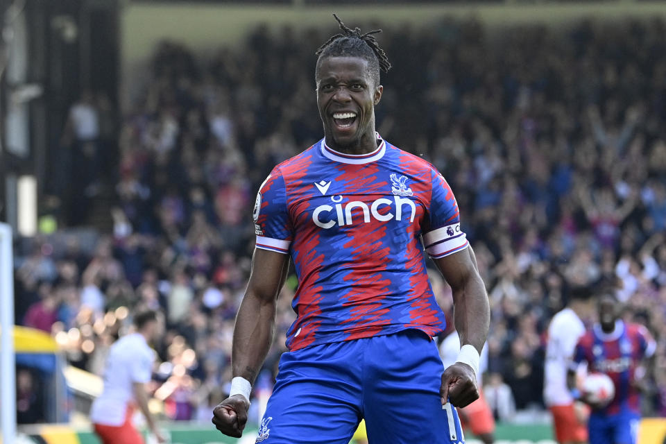 Crystal Palace’s Ivorian striker <a class="link " href="https://sports.yahoo.com/soccer/players/374786" data-ylk="slk:Wilfried Zaha;elm:context_link;itc:0">Wilfried Zaha</a> (Photo by JUSTIN TALLIS/AFP via Getty Images)