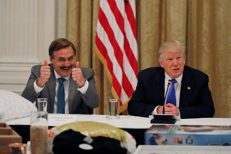 Michael Lindell ,CEO of My Pillow reacts as U.S. President Donald Trump attends a Made in America roundtable meeting in the East Room of the White House in Washington, U.S. July 19, 2017. REUTERS/Carlos Barria
