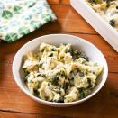 <p>This spinach artichoke take on baked pasta is so simple and has an easy creamy sauce that you'll be tempted to eat before ever adding the pasta.</p><p>Get the <a href="https://www.delish.com/uk/cooking/recipes/a35898428/spinach-artichoke-baked-tortellini-recipe/" rel="nofollow noopener" target="_blank" data-ylk="slk:Spinach Artichoke Baked Tortellini;elm:context_link;itc:0;sec:content-canvas" class="link ">Spinach Artichoke Baked Tortellini </a>recipe.</p>