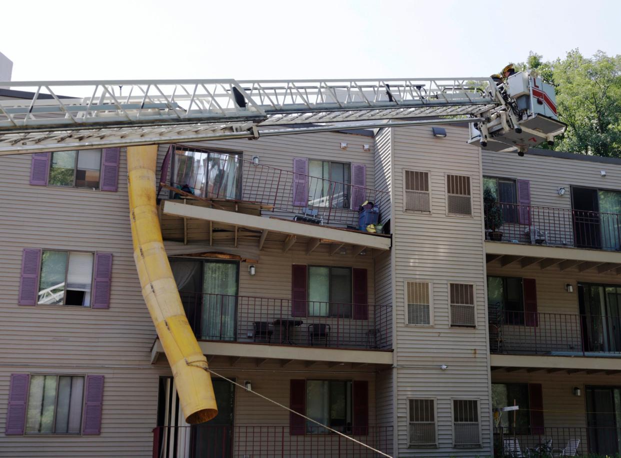 Firefighters at the scene of the partial collapse Friday morning.