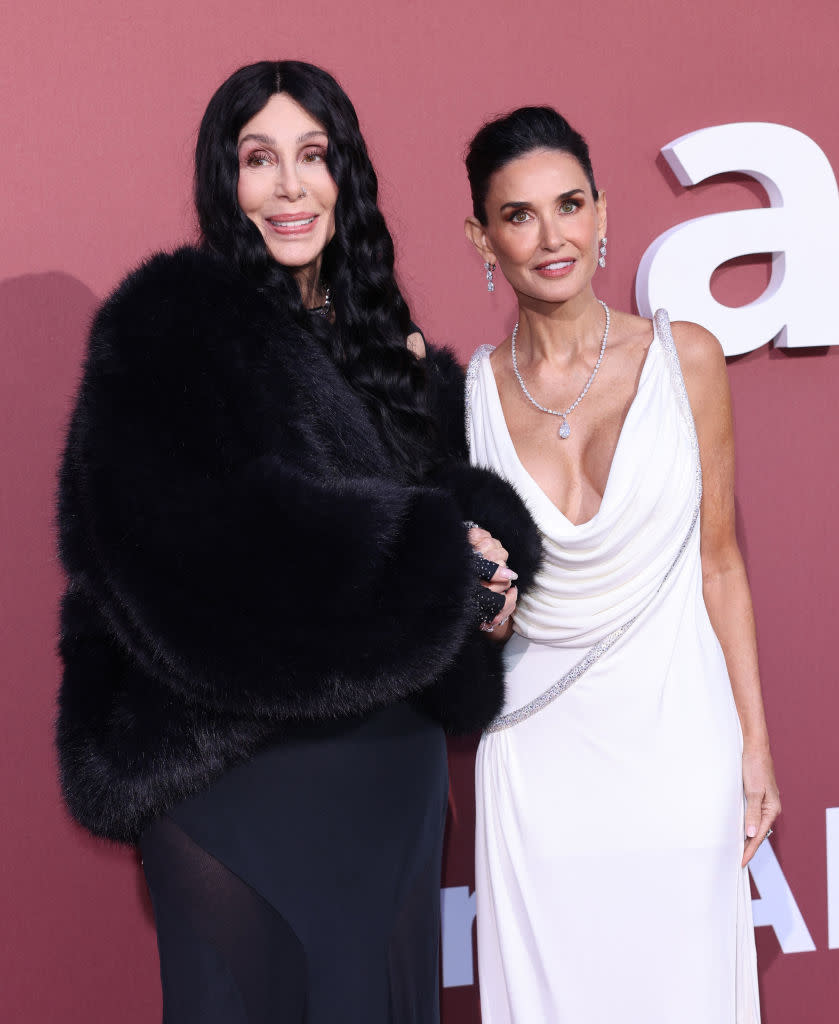 CAP D'ANTIBES, FRANCE - MAY 23: CAP D'ANTIBES, FRANCE - MAY 23: Cher (L) and Demi Moore attend the amfAR Cannes Gala 30th edition presented by Chopard And Red Sea International Film Festival at Hotel du Cap-Eden-Roc on May 23, 2024 in Cap d'Antibes, France. (Photo by Max Cisotti/Dave Benett/Getty Images)