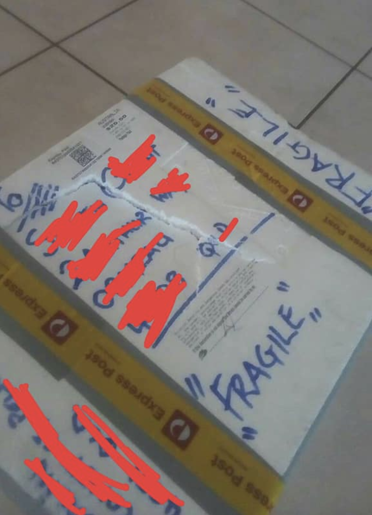 The package is seen with "fragile" written across it numerous times. Source: Facebook