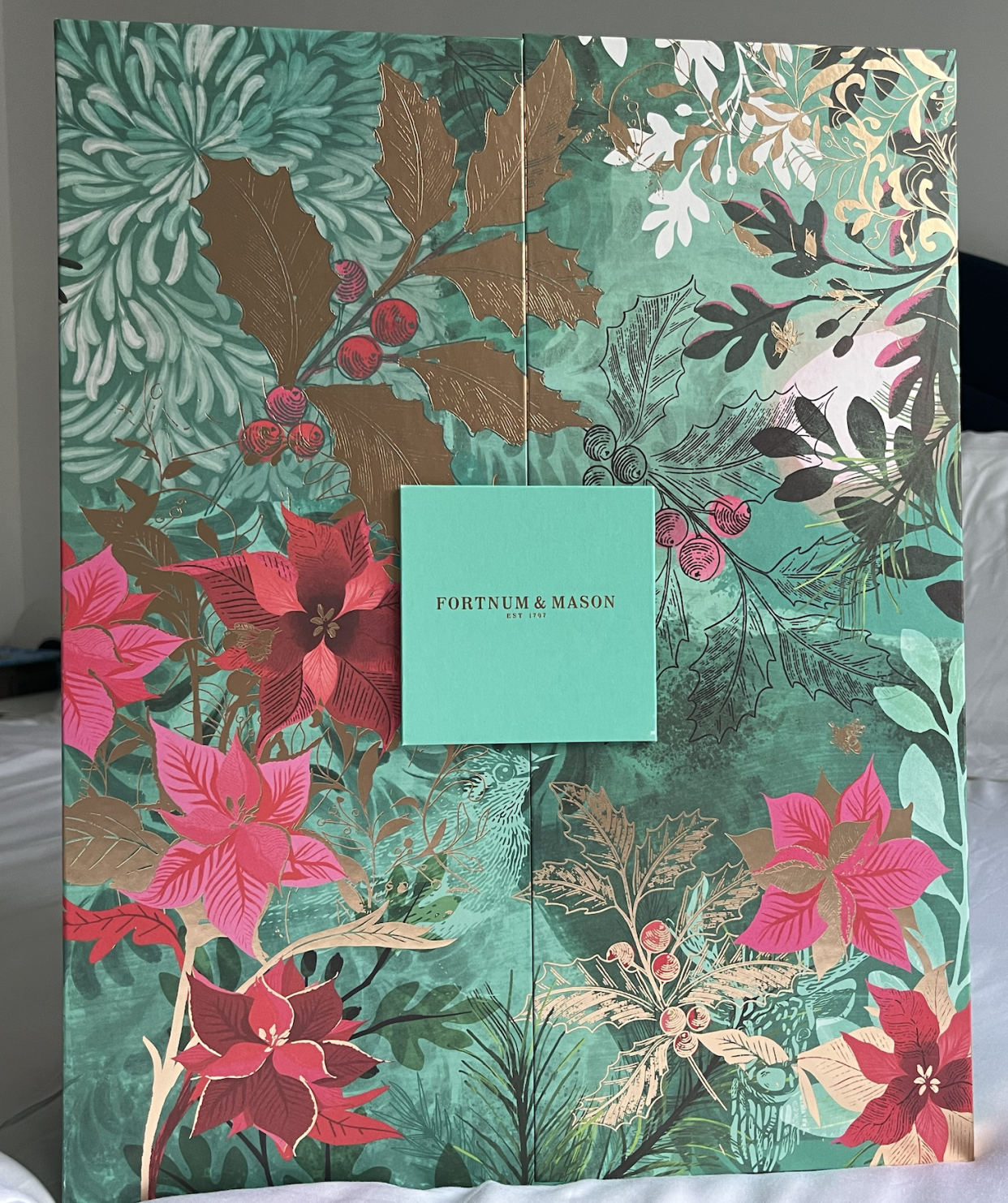 The calendar comes with a beautiful floral illustrated exterior, with the store's iconic mint green throughout. It's so pretty you may want to reuse it for years to come. (Yahoo Life UK)