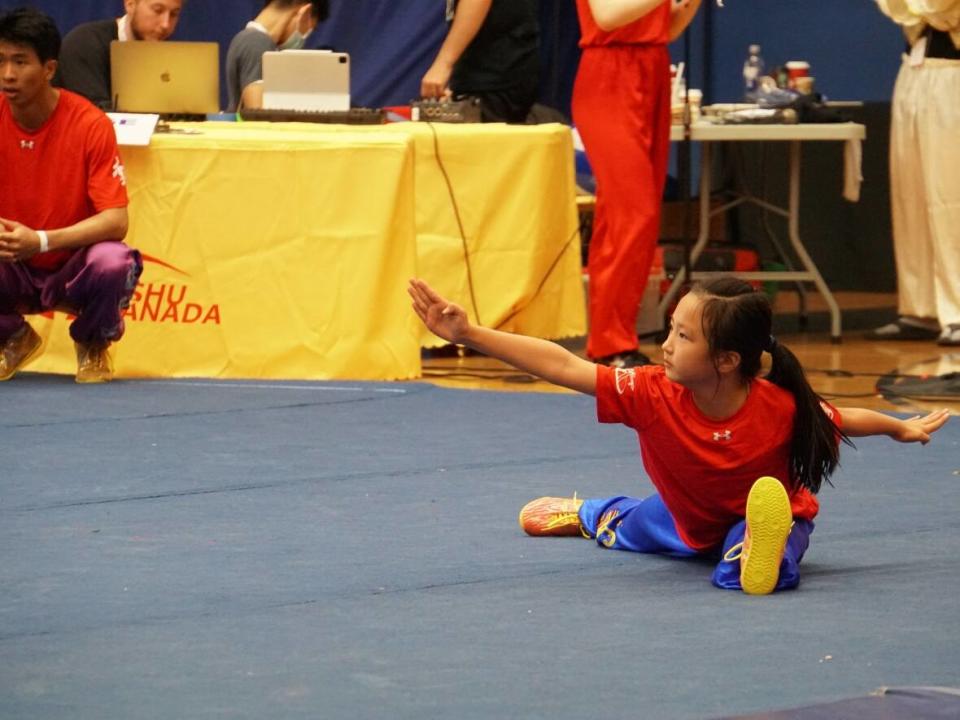 A competitor practices at the C.J. Sanders Fieldhouse on Friday, prior to the start of the 2022 Canadian Martial Arts Championships and Festival. (Kris Ketonen/CBC - image credit)