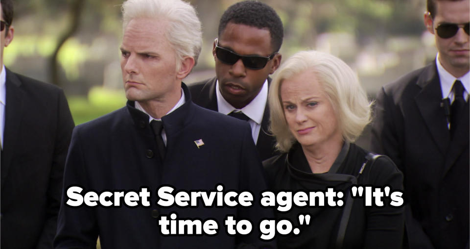 A Secret Service agent telling Ben and Leslie it's time to go