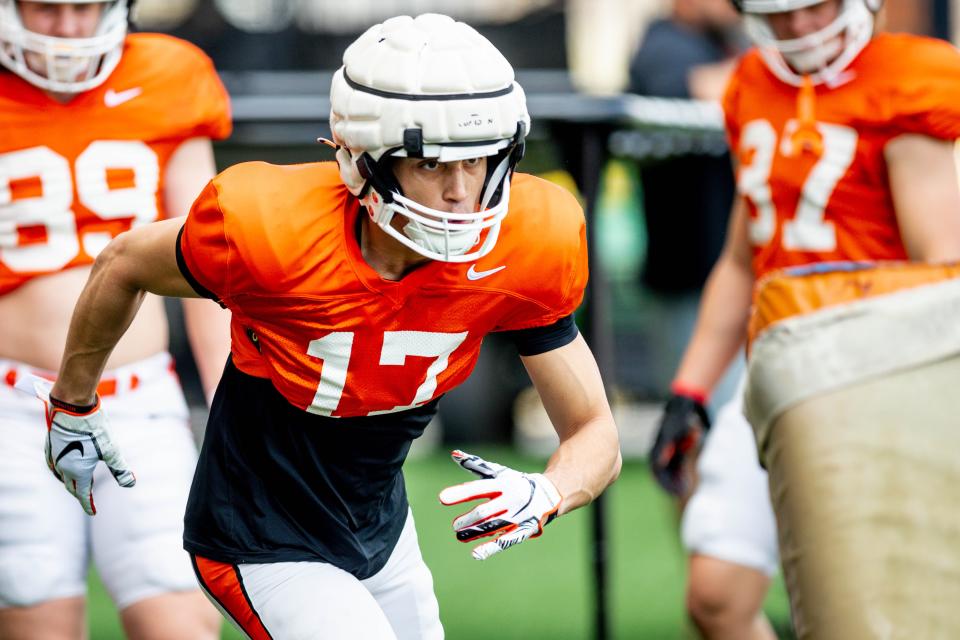 Oklahoma State’s Leon Johnson III (17) runs drills during an OSU Spring football practice at Sherman E. Smith Training Center in Stillwater, Okla., Monday, April 10, 2023.