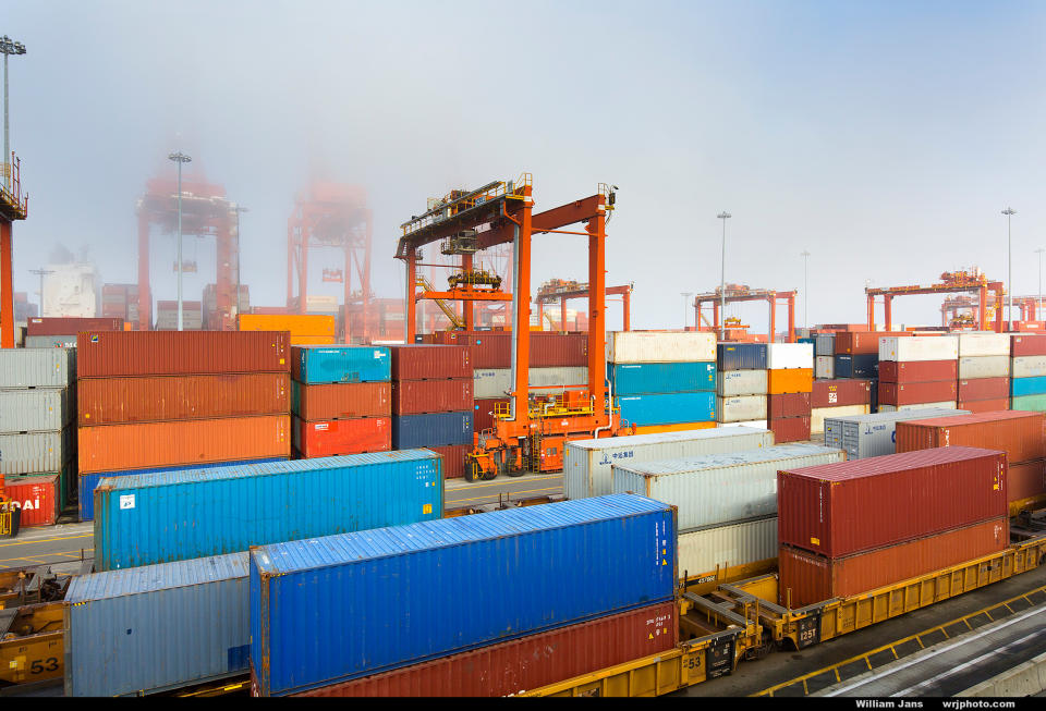 Images show containers, cranes and intermodal well cars at the Port of Vancouver's Centerm terminal.