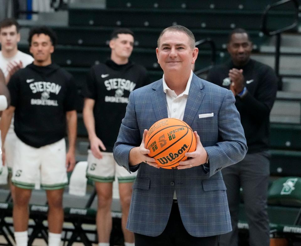 Stetson Head Coach Donnie Jones is honored before the game with Kennesaw State at Stetson's Edmunds Center, Thursday, Jan. 19, 2023.