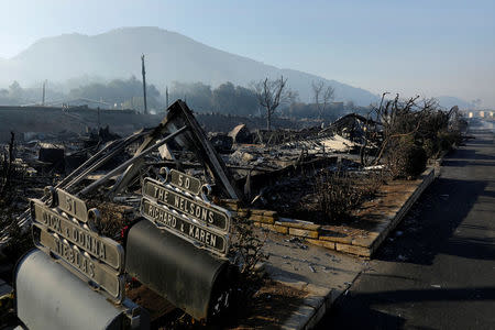 Burned mobile homes are seen at the Monserate Country Club after the Lilac Fire, a fast moving wildfire, swept through their community in Bonsall, California, U.S., December 8, 2017. REUTERS/Mike Blake