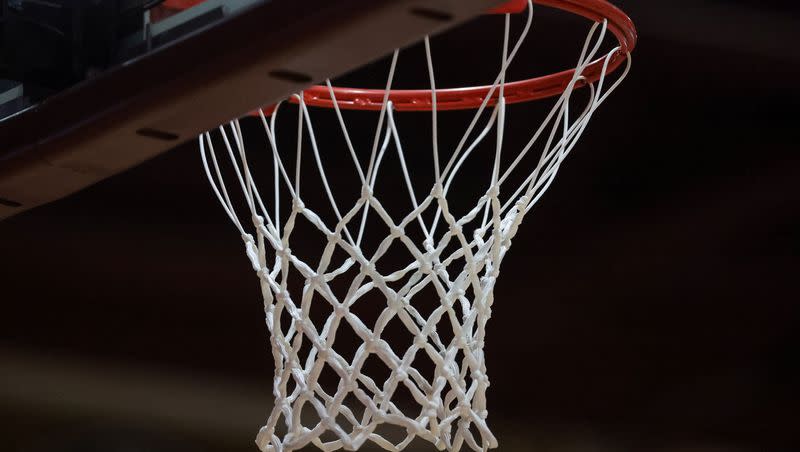 The hoop is pictured during a high school basketball game on Tuesday, Dec. 12, 2023.