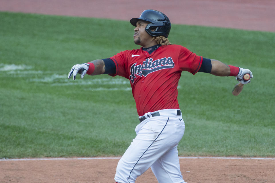 Cleveland Indians' Jose Ramirez watches his double off Pittsburgh Pirates relief pitcher Nik Turley during the seventh inning of a baseball game in Cleveland, Sunday, Sept. 27, 2020. (AP Photo/Phil Long)