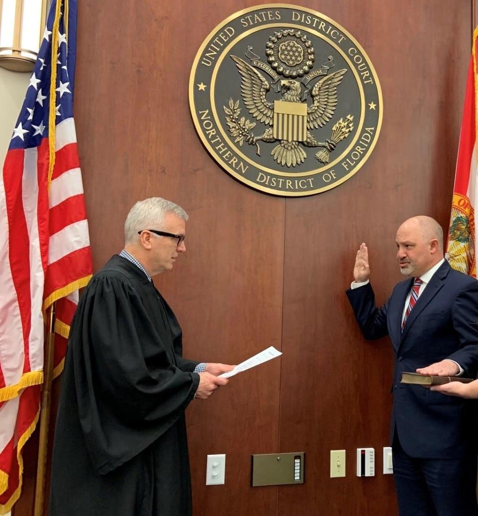 Chief U.S. District Judge Mark Walker swears in Jason Coody as U.S. attorney for the Northern District of Florida.