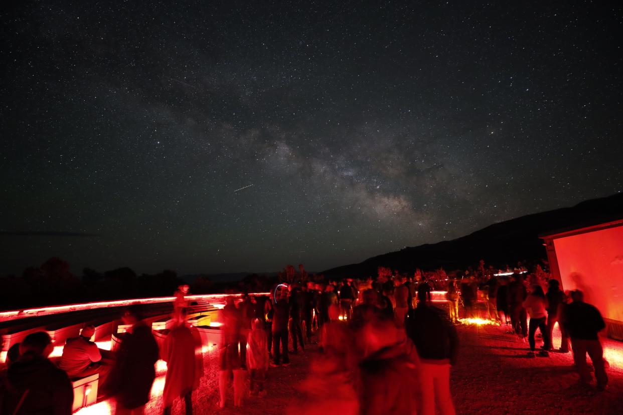 Great Basin National Park uses red lights to minimize light pollution as stargazers enjoy the night sky.
