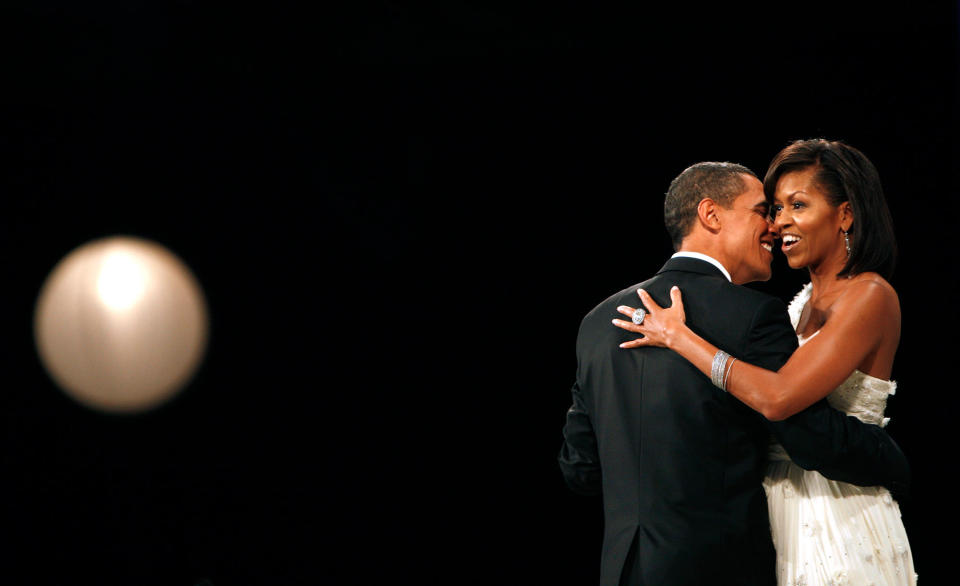 <p>President Barack Obama and first lady Michelle Obama dance at the Home States Ball in Washington January 20, 2009. Obama took power as the first black U.S. president on Tuesday and quickly turned the page on the Bush years, urging Americans to rally to end the worst economic crisis in generations and repair the U.S. image abroad. (Carlos Barria/Reuters) </p>