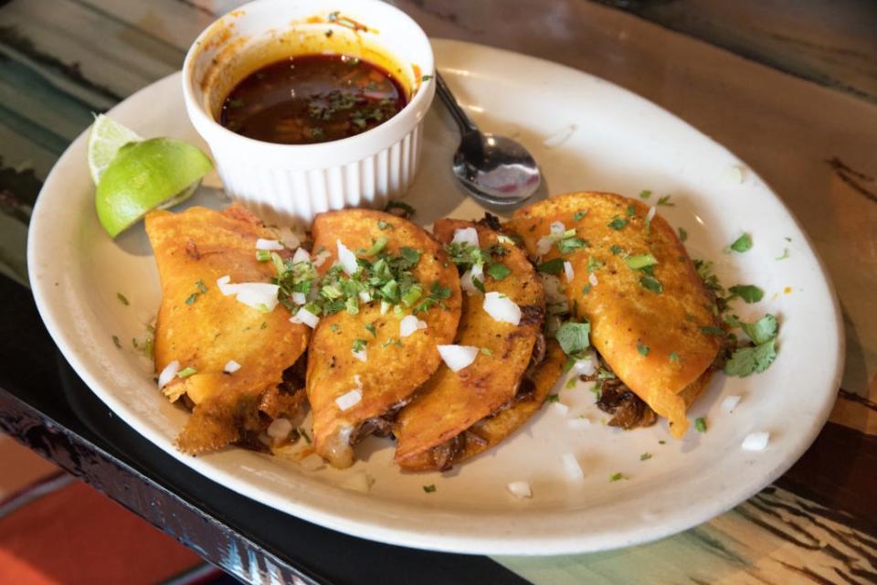 An order of beef birria-stuffed tacos at El Fogoncito restaurant in Jupiter.