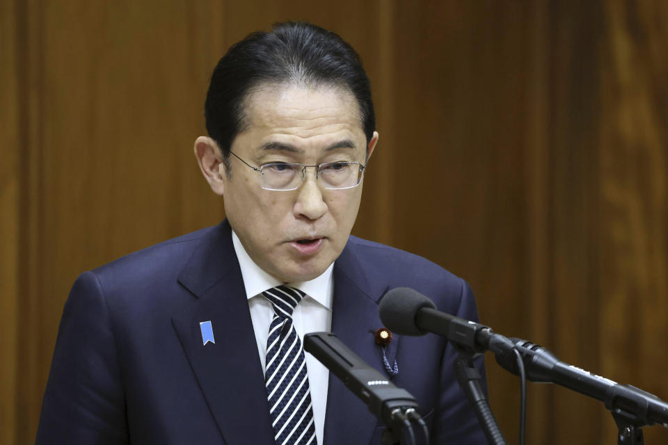 Japan's Prime Minister Fumio Kishida speaks during a political ethics committee at parliament in Tokyo Thursday, Feb. 29, 2024. (Japan Pool/Kyodo News via AP)