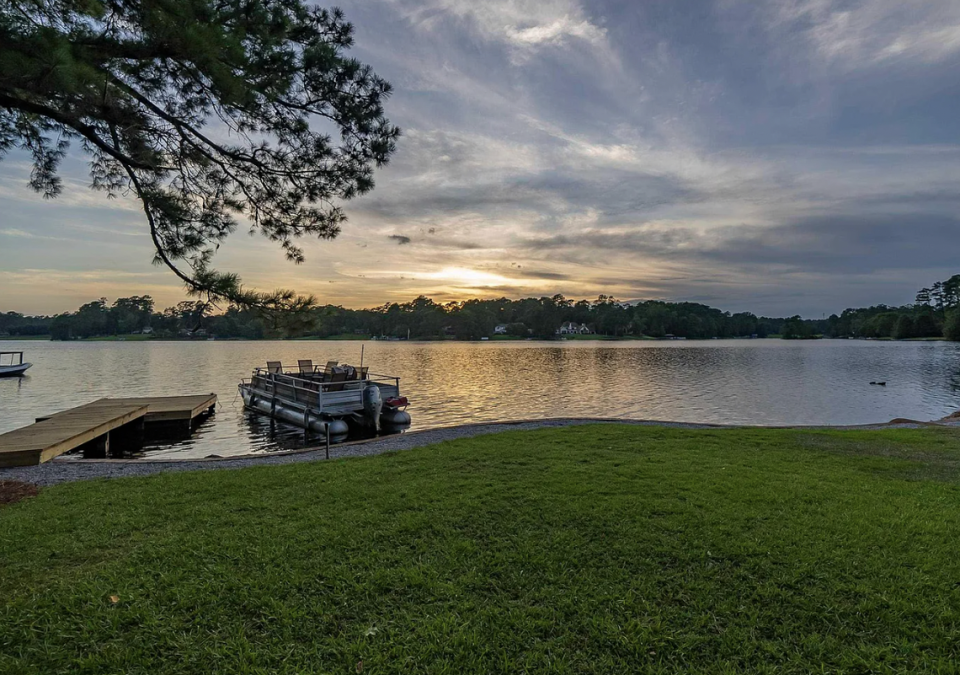 Located at 5841 Lakeshore Drive in Columbia, the property includes two homes on two acres.