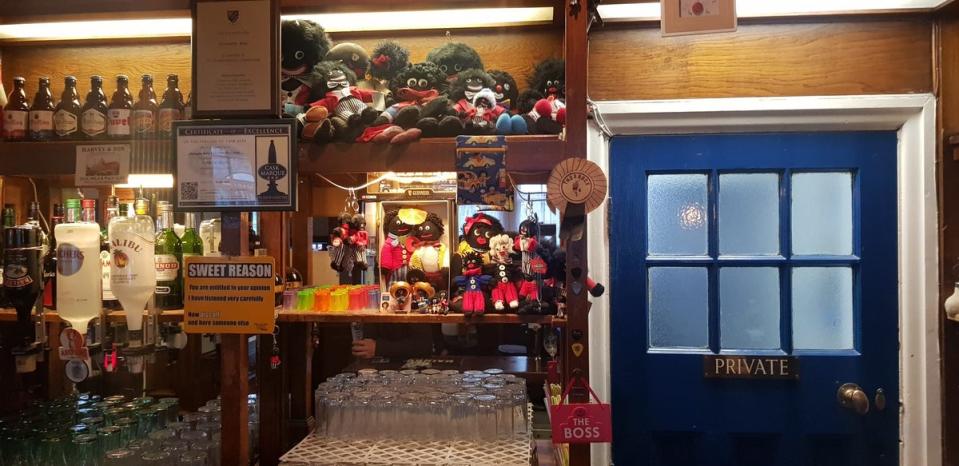 The dolls in the pub before they were seized by Essex Police (Benice Ryley / SWNS)