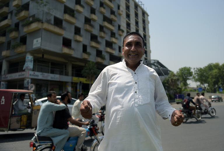 Pakistani bus driver Meher Khalil, who drove the Sri Lankan cricket team to safety when it came under a gun and grenade attack by militants in March 2009, speaks to AFP at the site of the attack in Lahore on May 21, 2015