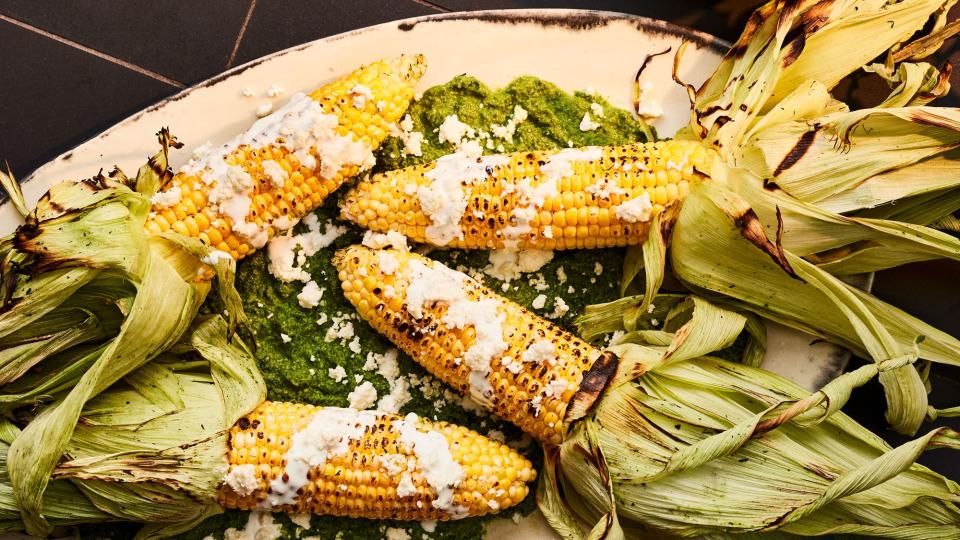 Elote with mole Verde