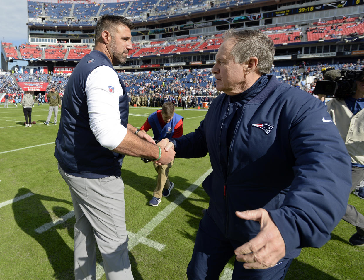 Tennessee Titans head coach Mike Vrabel, left, greets New England Patriots head coach Bill Belichick before last week's game. (AP)