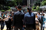 The Wider Image: On trial on riot charges, Hong Kong newlyweds prepared for life apart