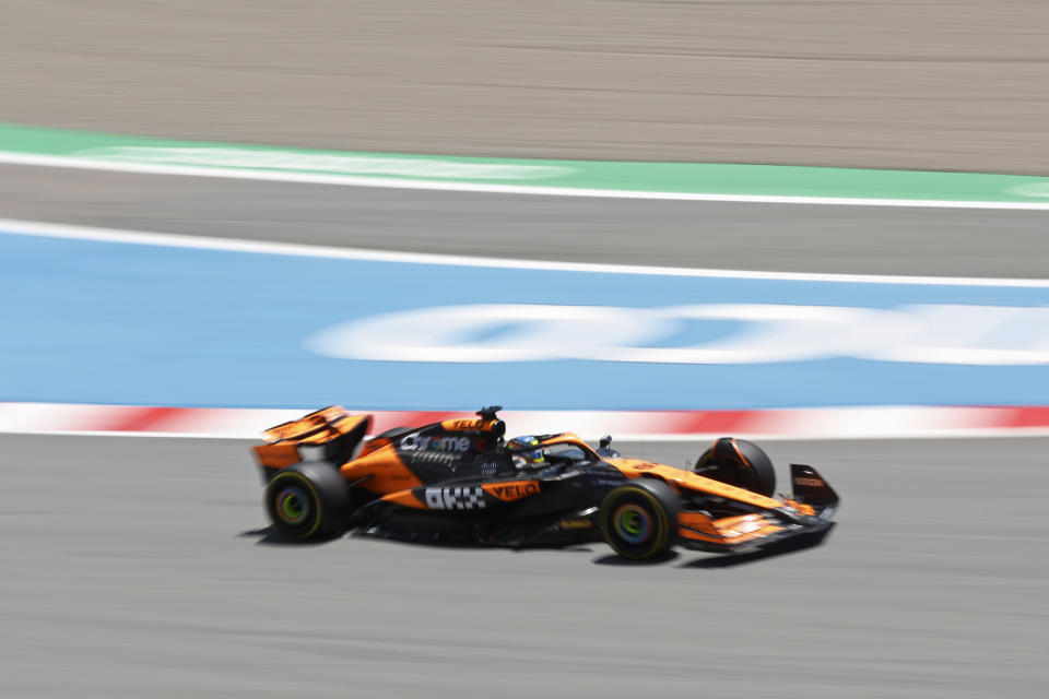 McLaren driver Lando Norris of Britain steers his car during the 1st practice session for the Formula 1 Spanish Grand Prix at the Barcelona Catalunya racetrack in Montmelo, near Barcelona, Spain, Friday, June 21, 2024. The race will be held on Sunday. (AP Photo/Joan Monfort)