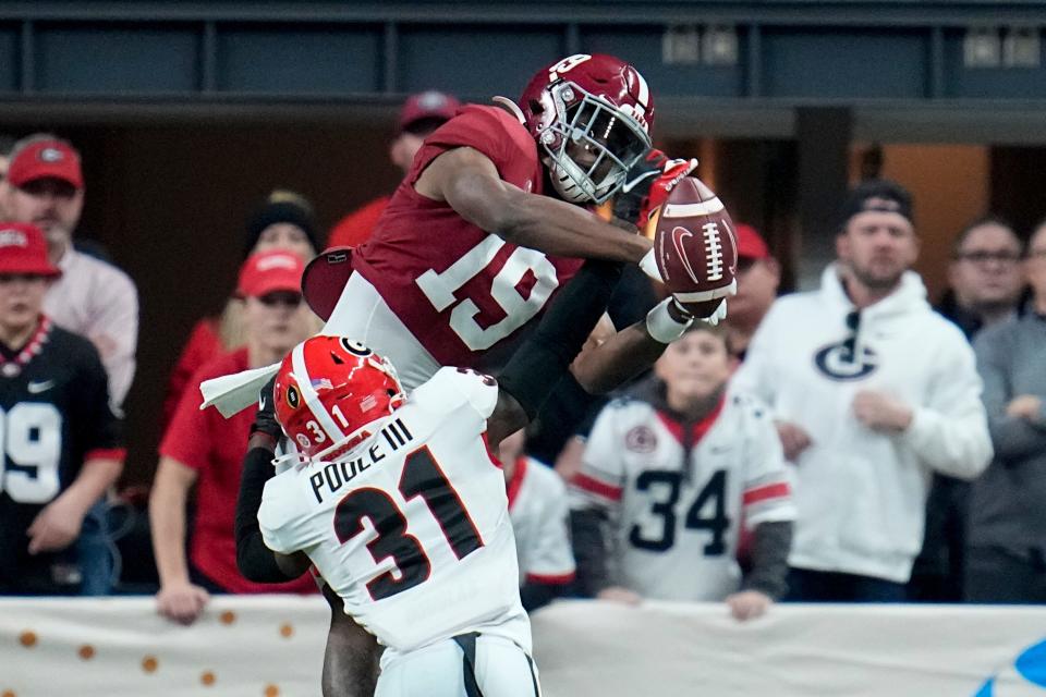 Georgia's William Poole breaks up a pass intended for Alabama's Jahleel Billingsley during the first half of the College Football Playoff championship football game Monday, Jan. 10, 2022, in Indianapolis. (AP Photo/Paul Sancya)