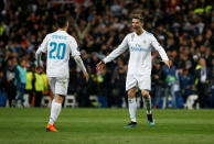 <p>Soccer Football – Champions League Quarter Final Second Leg – Real Madrid vs Juventus – Santiago Bernabeu, Madrid, Spain – April 11, 2018 Real Madrid’s Cristiano Ronaldo celebrates with Marco Asensio after the match REUTERS/Stringer </p>