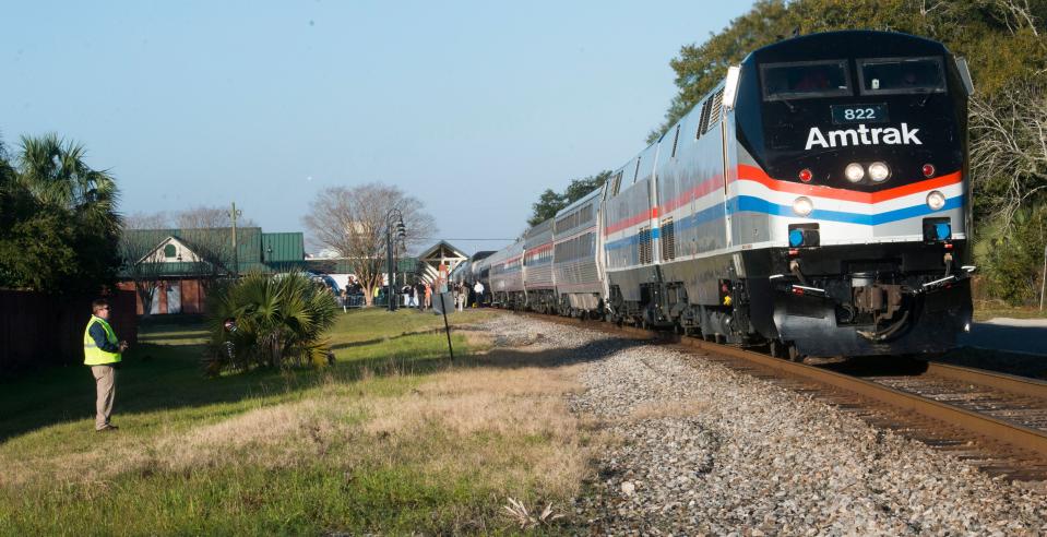 An Amtrak train stops at the Heinberg Street station in Pensacola Friday morning Feb. 19, 2016. Amtrak is investigating using a portion of the $66 billion it was allocated in the Infrastructure Investment & Jobs Act to reestablish commuter rail service in Northwest Florida.