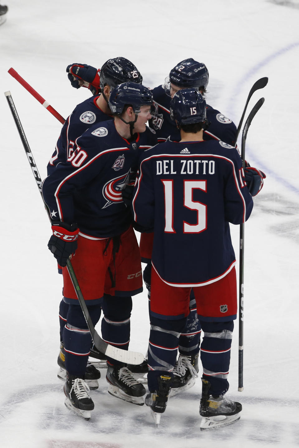 Columbus Blue Jackets players celebrate a goal against the Nashville Predators during the third period of an NHL hockey game Thursday, Feb. 18, 2021, in Columbus, Ohio. The Blue Jackets beat the Predators 3-0. (AP Photo/Jay LaPrete)