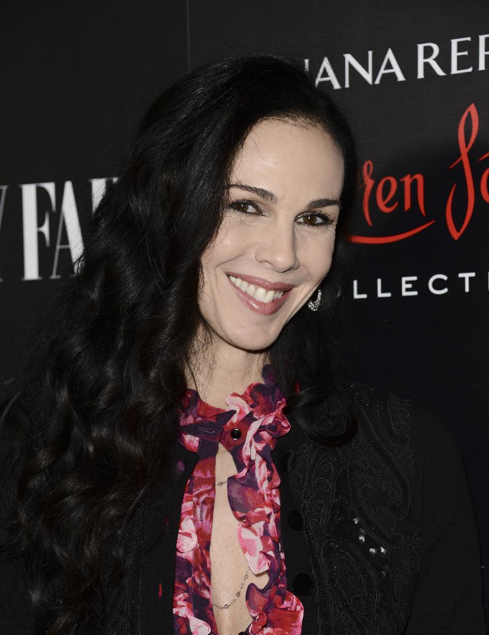 FILE - This Nov. 19, 2013 file photo shows fashion designer L'Wren Scott at the Banana Republic L'Wren Scott Collection launch party at the Chateau Marmont in West Hollywood, Calif. Scott, a fashion designer, was found dead, Monday, March 17, 2014, in Manhattan. (Photo by Dan Steinberg/Invision/AP, File)