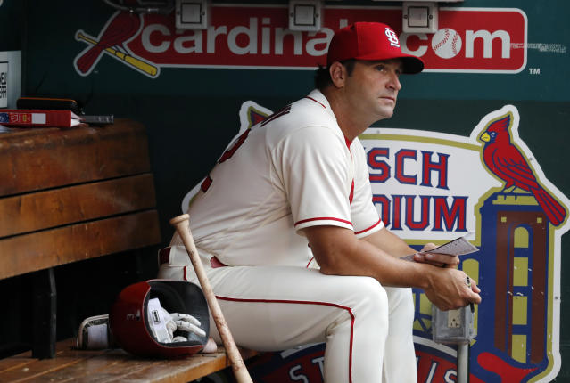 St. Louis Cardinals catcher Mike Matheny, left, and starting pitcher Chris  Carpenter (29) confer on the mound in the fourth inning against the Arizona  Diamondbacks, Saturday, Sept. 18, 2004, in St. Louis.