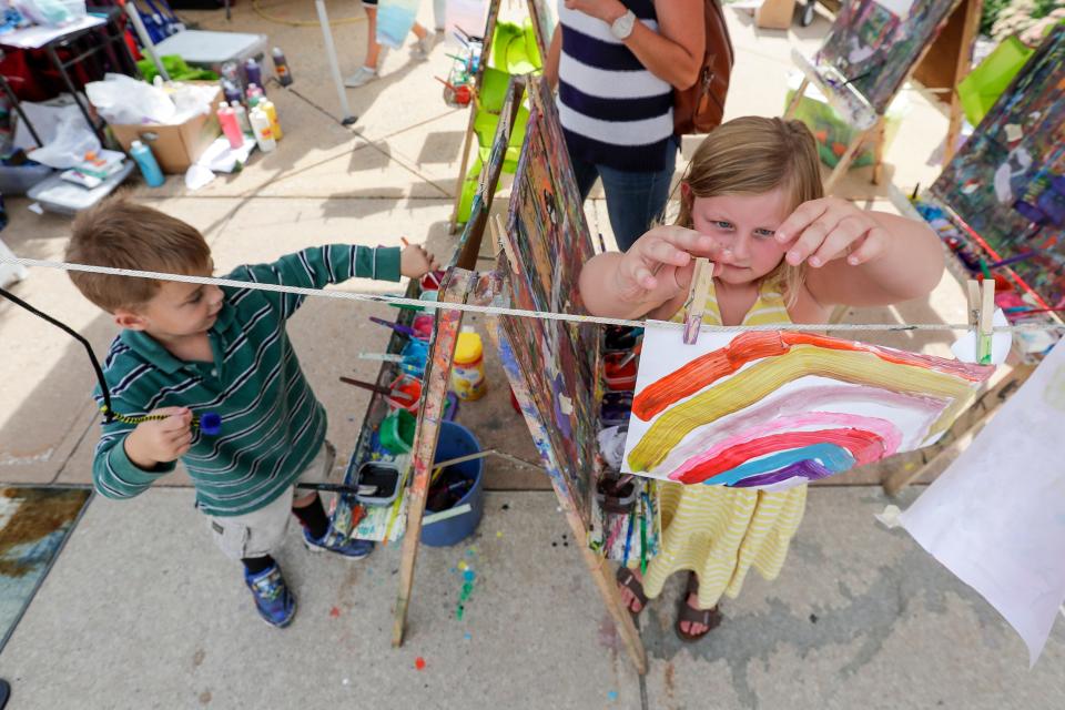 Children make paintings at Artstreet in 2019. There will once again be hands-on creative activities for kids at this year's Artstreet, along with a project families can do together.