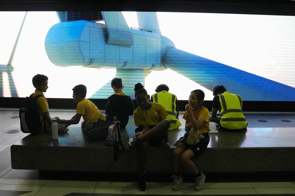 Students visit Masdar City near Abu Dhabi, United Arab Emirates, as Dubai hosts the COP28 U.N. Climate Summit, Friday, Dec. 8, 2023. (AP Photo/Kamran Jebreili)