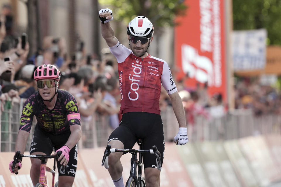 France's Benjamin Thomas celebrates winning the fifth stage of the Giro d'Italia, Tour of Italy cycling race, from Genoa to Lucca, Wednesday, May 8, 2024. (Massimo Paolone/LaPresse via AP)