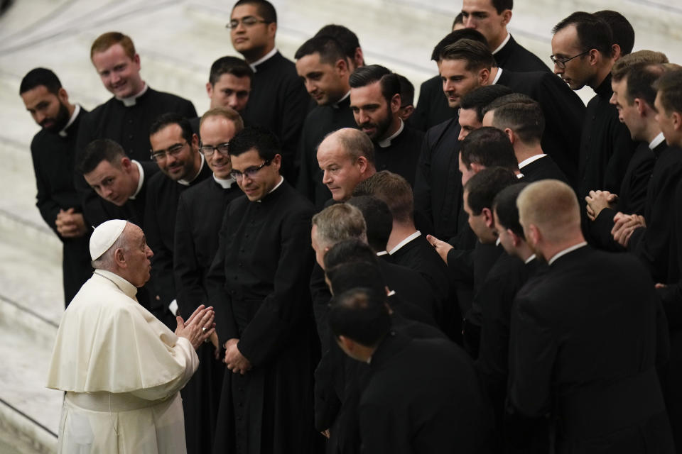 Pope Francis meets a group of seminarians during his weekly general audience in the Paul VI Hall at the Vatican, Wednesday, Sept. 29, 2021. (AP Photo/Alessandra Tarantino)