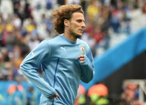 El delantero uruguayo Diego Forlán entrena en Sao Paulo el 19 de junio de 2014 (AFP/Archivos | Luis Acosta)